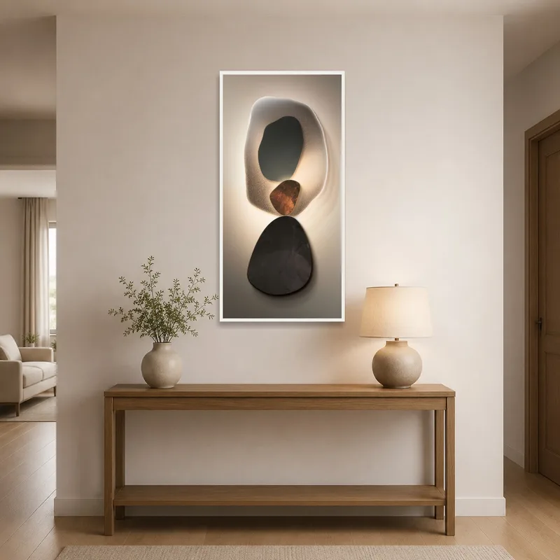 Art print with illuminated shapes greeting guests in a stylish entrance hall.