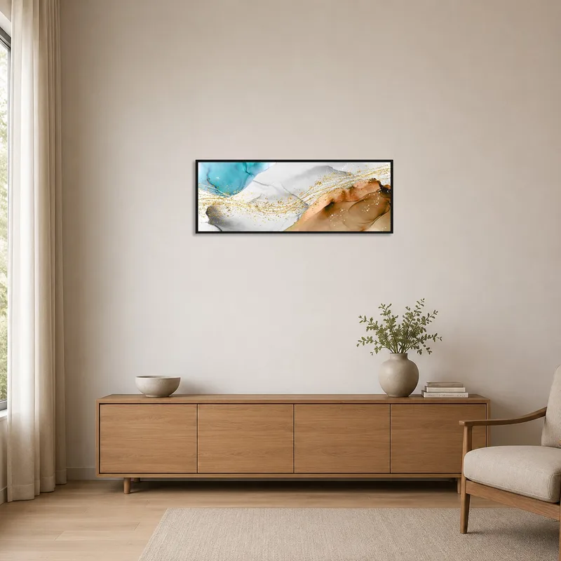 Minimalist room featuring abstract panoramic artwork with gold accents on a crisp, white wall.