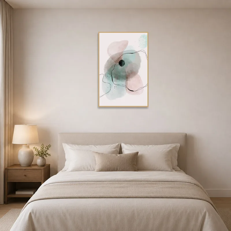 Serene abstract watercolor enhances the calming ambiance of a bedroom.