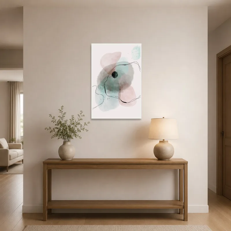 Soft-colored abstract watercolor welcomes guests in a stylish entrance hall.