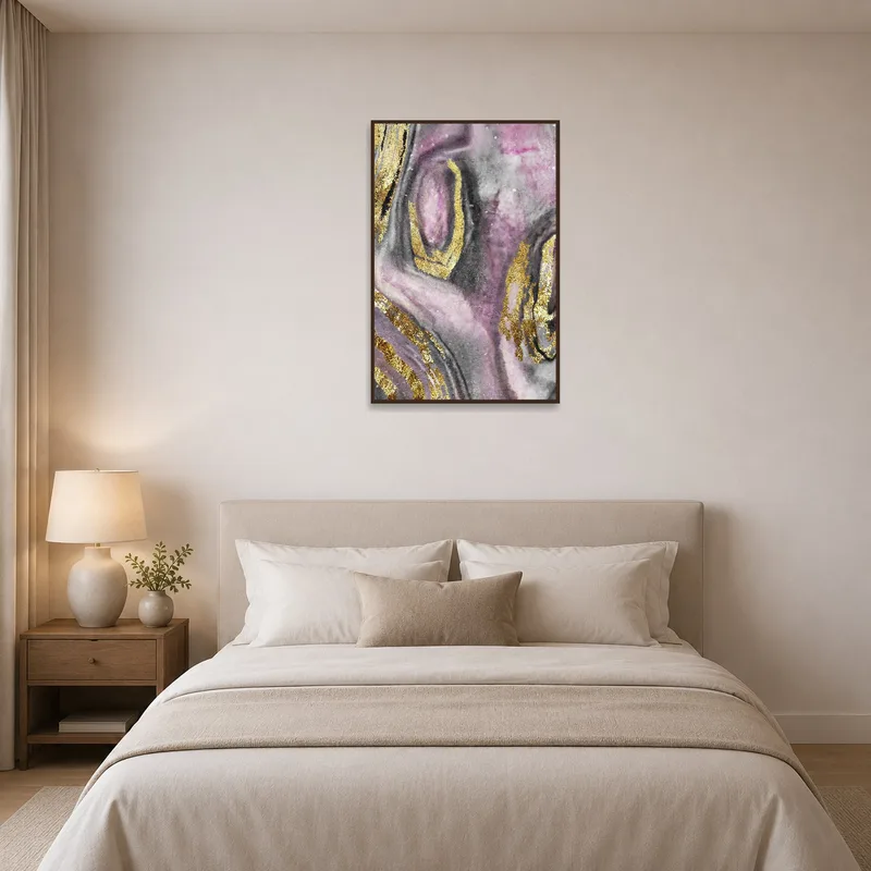 Abstract pink and gold fluid art providing a calming bedroom presence.