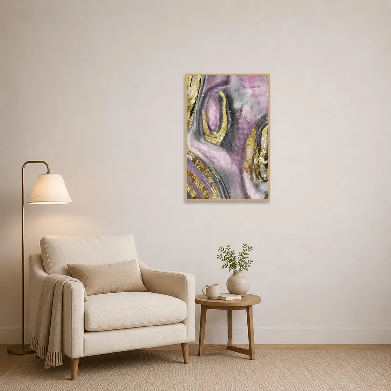 Abstract pink and gold canvas adding elegance to a reading nook.