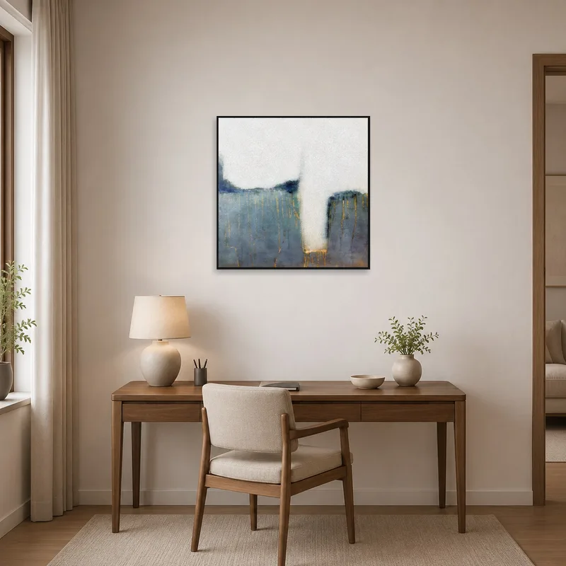 Abstract blue and gold art piece enhancing a modern home office.