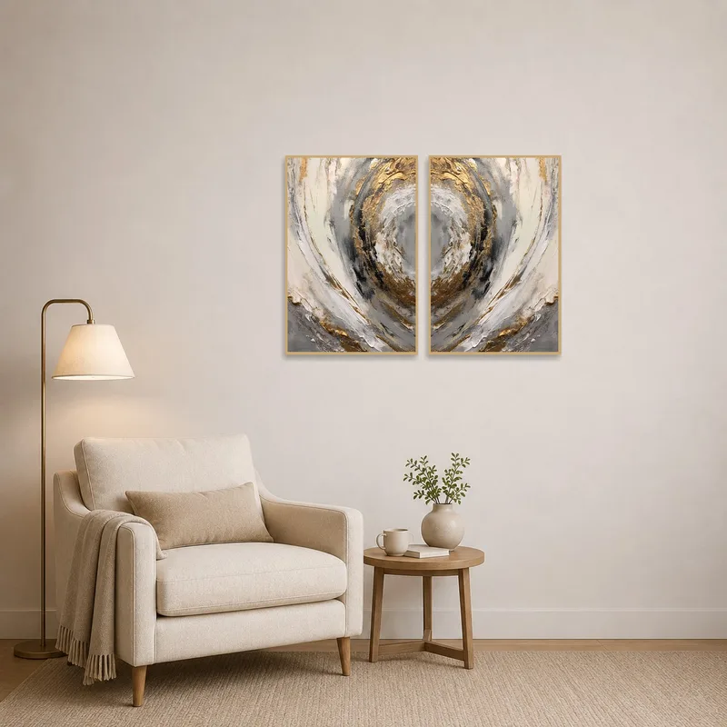 Reading corner with Abstract Swirl Dual Piece with Gold Accents on the wall beside a cozy armchair.