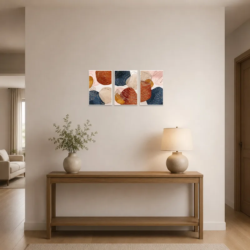 Earthy toned triptych greeting guests in an elegant entrance hall.