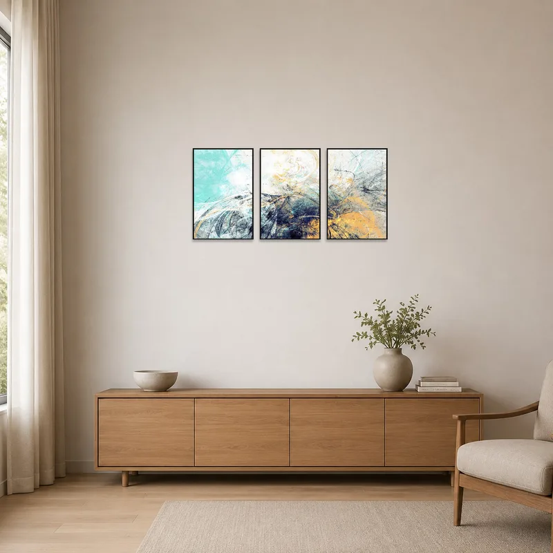 Minimalist room with abstract triptych in turquoise and amber hues on a stark white wall.