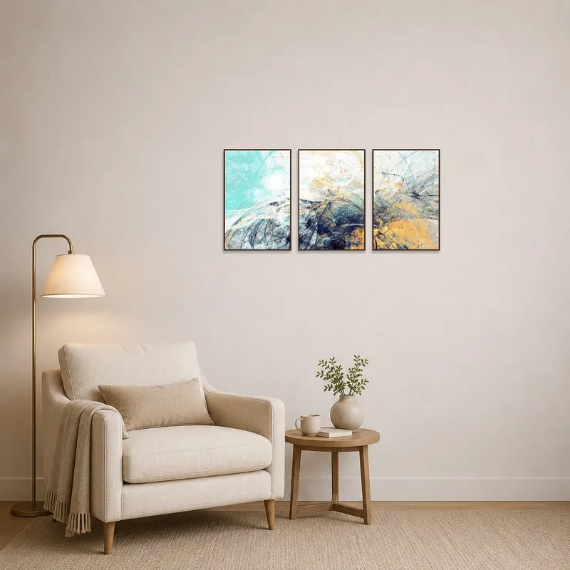 Reading corner adorned with an abstract turquoise and amber triptych set.