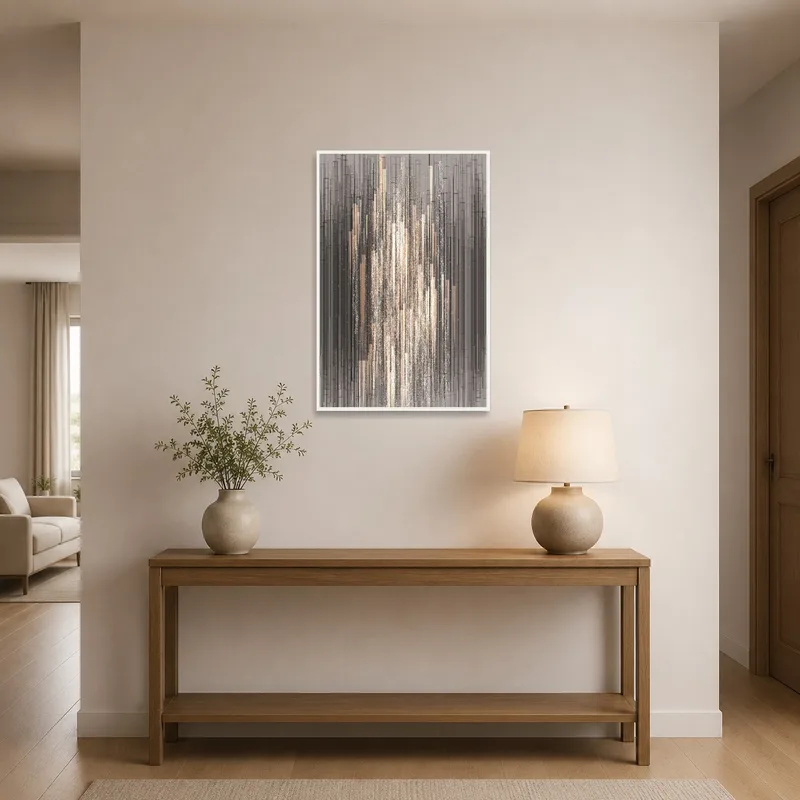 Abstract geometric art greets with vertical lines in an entrance hall above a sleek console table.