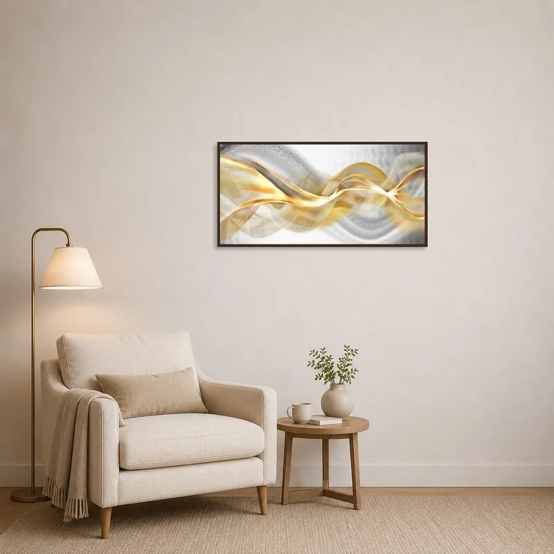 An abstract wave piece in gold and silver adding flair to a cozy reading corner.