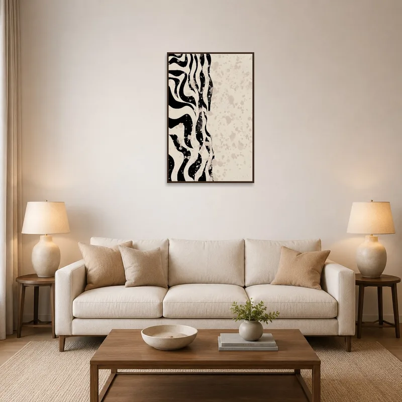 Abstract Waves and Splatter Art Print in a living room above a modern sofa.