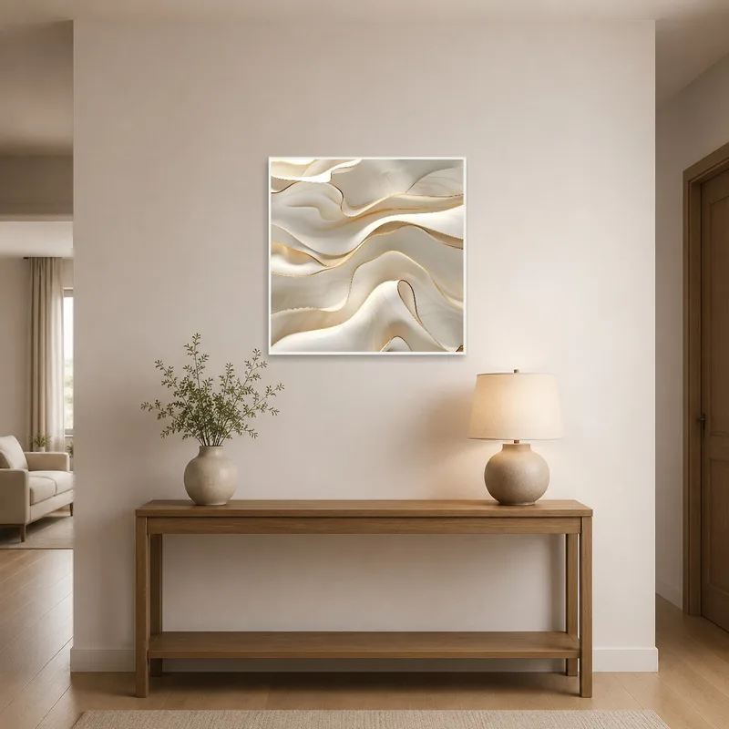 Entrance hall featuring abstract cream and gold waves art welcoming guests.