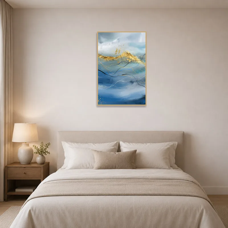 Elegant abstract wave art with gold highlights displayed above a bed in a bedroom.
