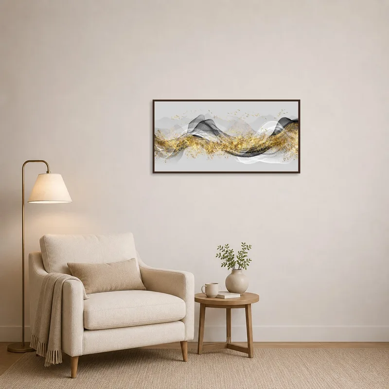 Reading corner adorned with abstract waves and gold accents art above a cozy armchair.