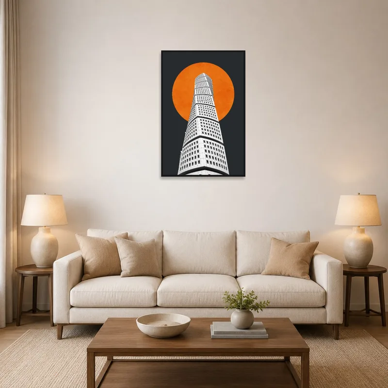A living room with an architectural tower art next to an orange sun design on the wall.