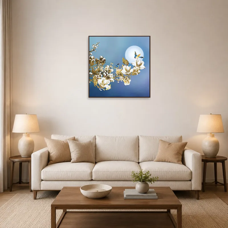 A serene moonlit birds and blossoms art piece in a cozy living room setting.