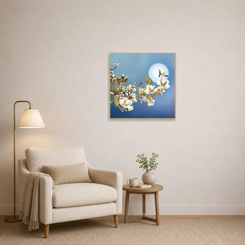 A peaceful reading corner with a moonlit birds and blossoms piece.
