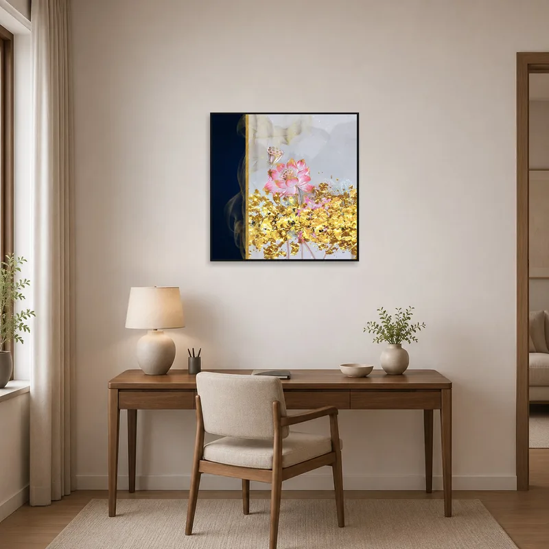 Golden accented lotus print hangs in a sophisticated home office with a tidy desk.