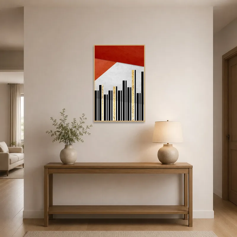 Eye-catching geometric art with gold accents enhances an entrance hall.