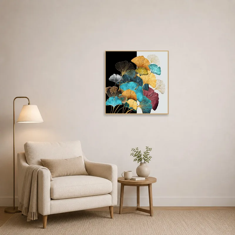 A cozy reading corner enhanced by a bold ginkgo leaf abstract art piece.