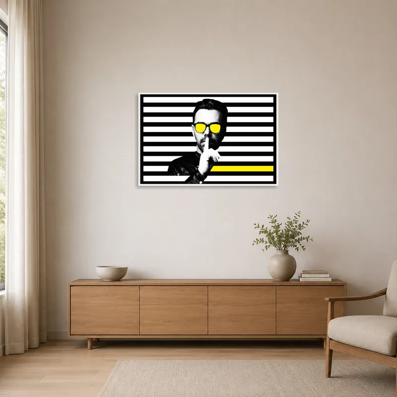Art piece with yellow highlights in a minimalist space, complementing the simplicity.