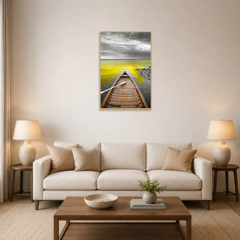 Artwork of a canoe on a yellow-hued lake under stormy skies in a living room.
