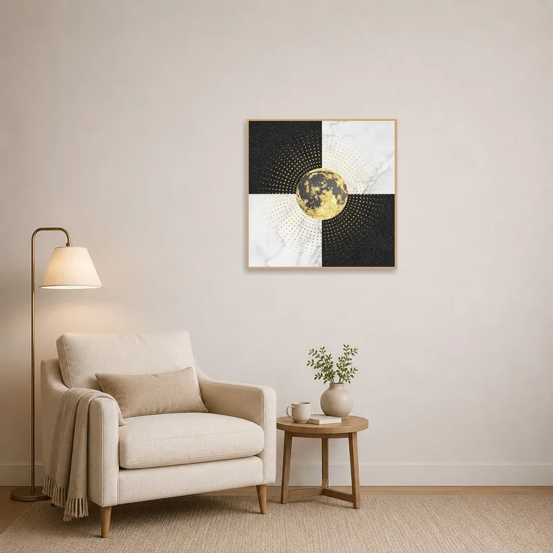 Artwork adds elegance to a reading corner with a cozy chair and lamp.