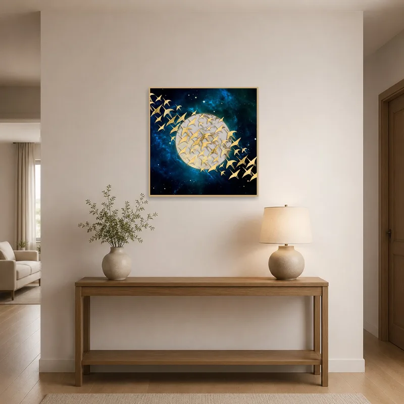 Entrance hall featuring gold birds flying over a moon artwork.