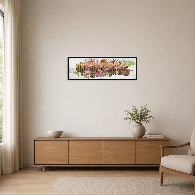 Pink floral artwork in a minimalist room with sparse furniture.