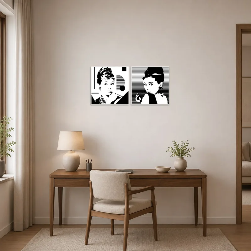 Chic black and white fashion prints enhance the home office wall ambiance.