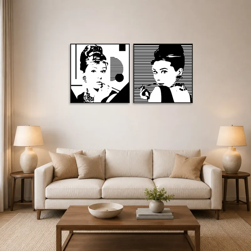 Stylish black and white fashion prints add elegance to the living room wall.