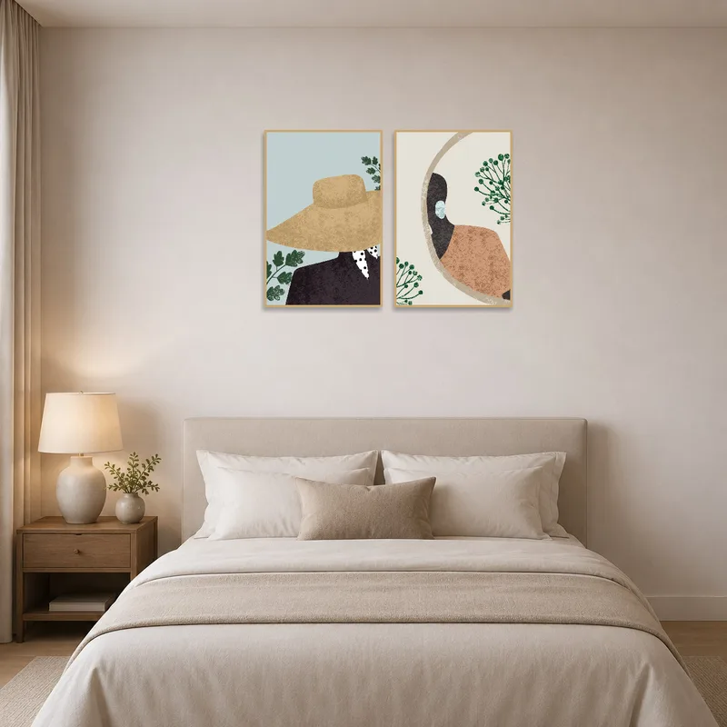 Duo art set adding sophistication above a cozy bedroom setting.