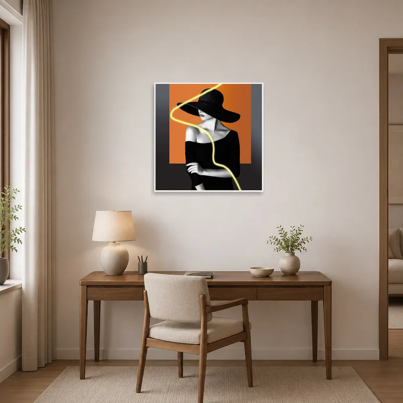 Home office chic with a noir portrait enhanced by neon accents on the wall.
