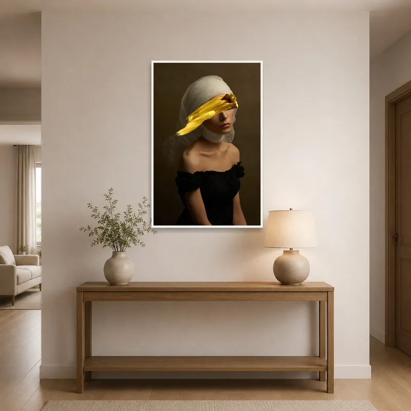 Traditional portrait highlighted with gold in an entrance hall.