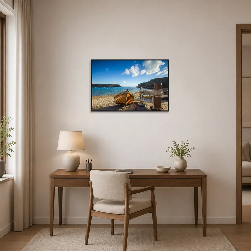 Home office wall art of a wooden boat on a rocky shore.