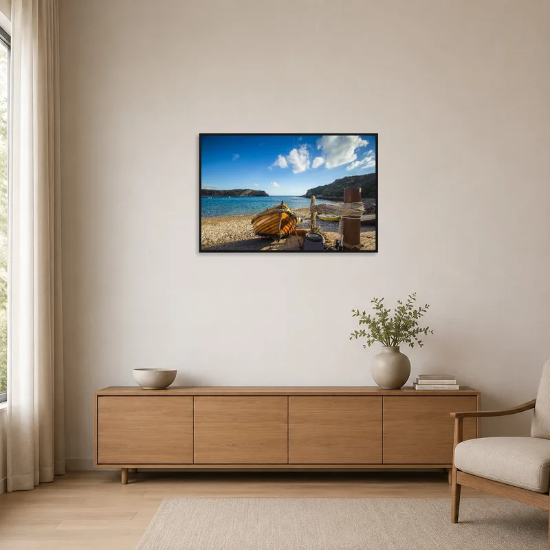 Simple room showcasing a wooden boat on a rocky shore.