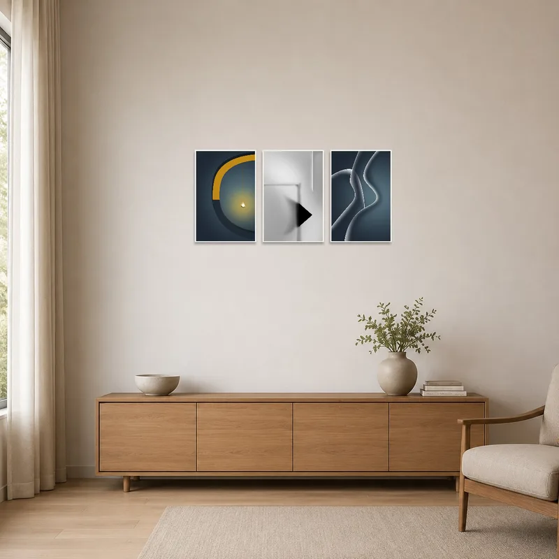 Triptych abstract prints enhance a clean, minimalist room with subtle yet striking visuals.