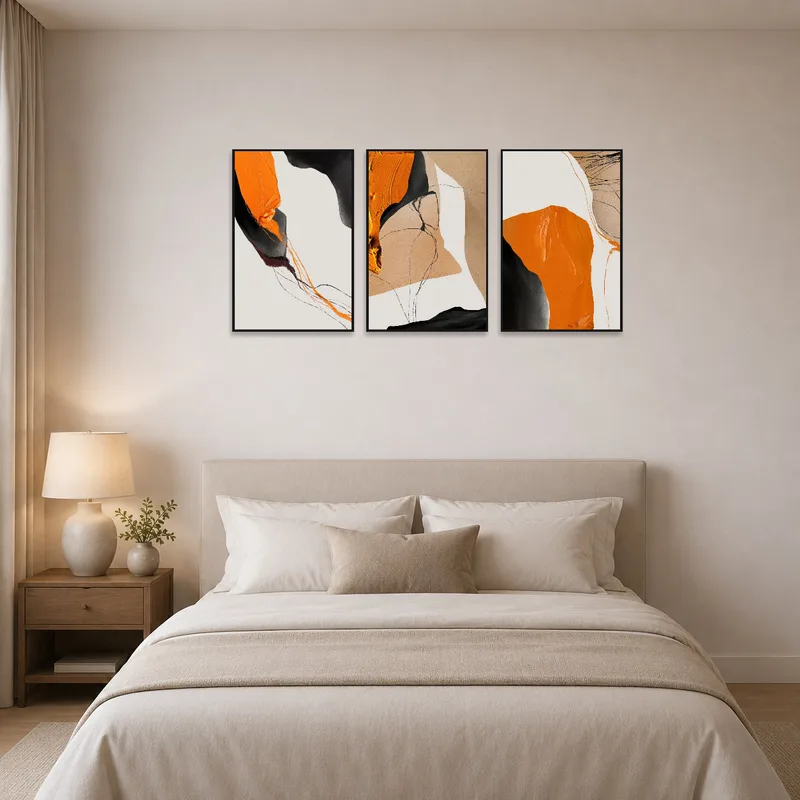 Vibrant abstract triptych enhancing a serene bedroom.