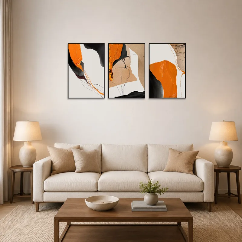 Triptych with bold hues hanging in a stylish living room.