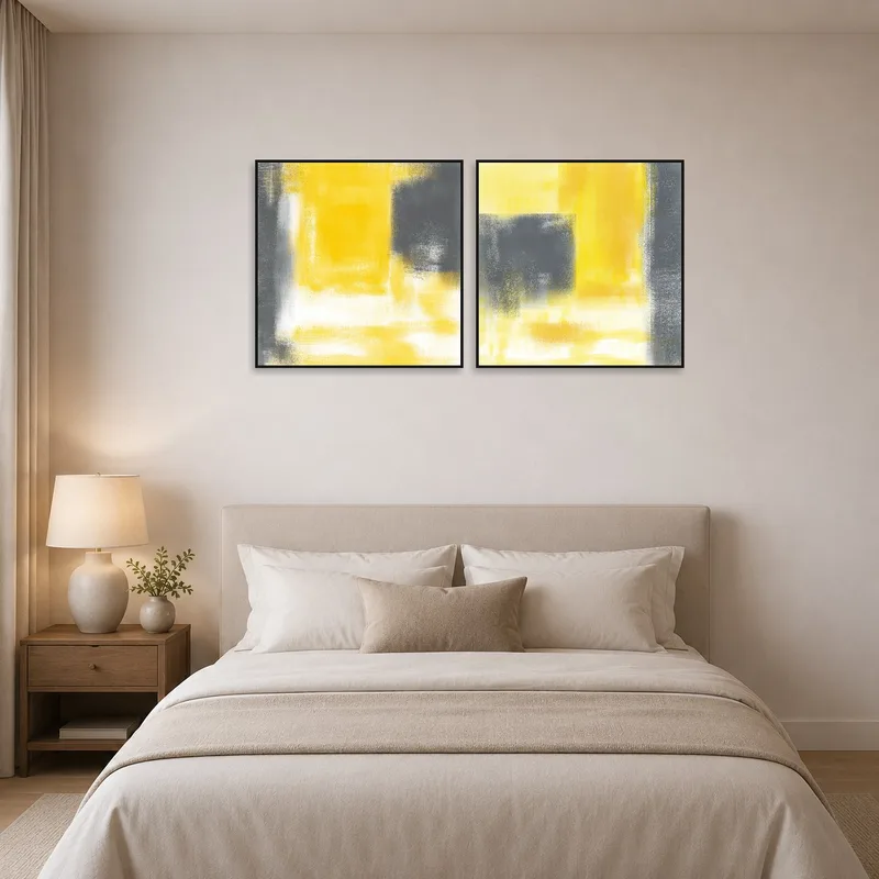 Square abstract pieces adding modern flair to the bedroom.