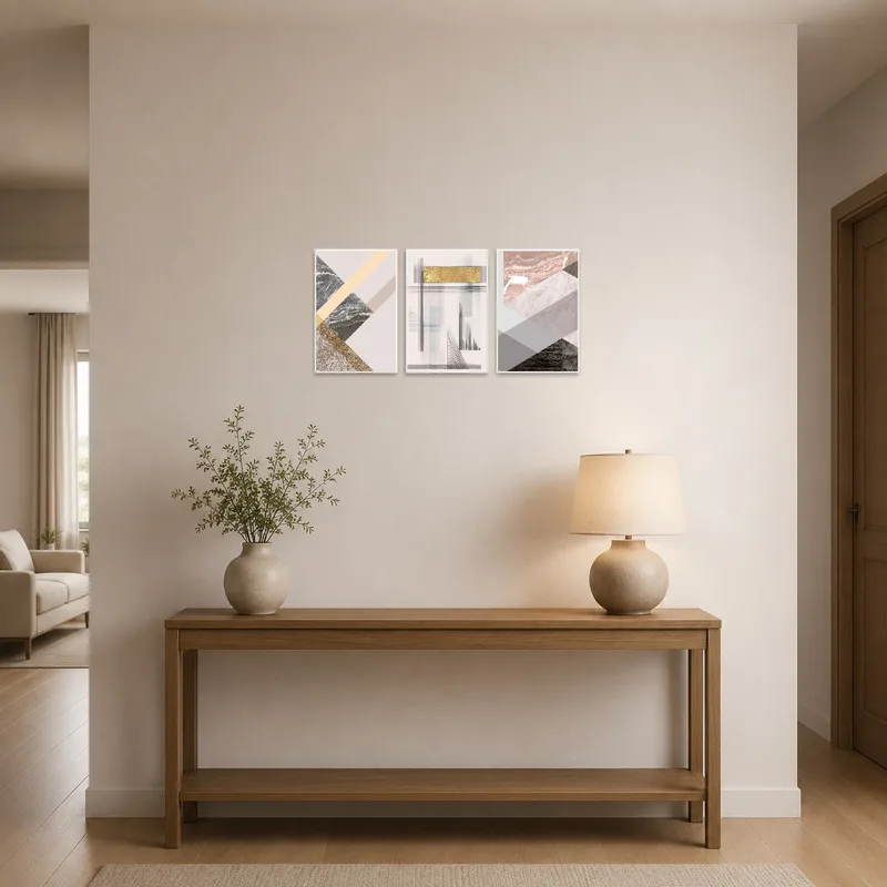 Bold geometric abstract triptych on entrance hall wall.