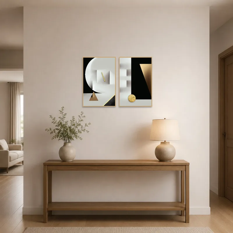 Art set with gold touches adds elegance to a stylish entrance hall.