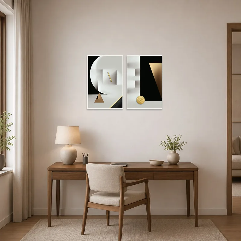 Contemporary art set with gold elements enhances a chic home office space.