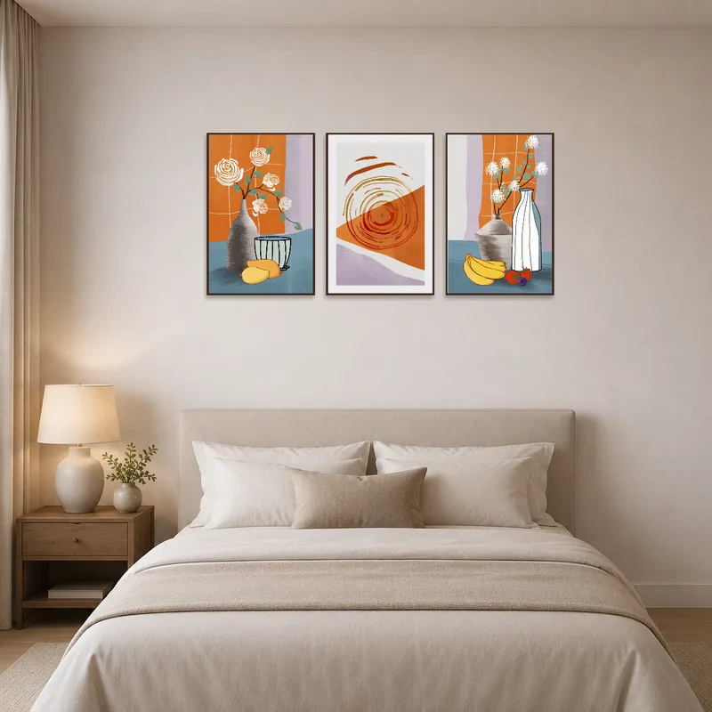 A bedroom wall showcasing a harmonious still life and abstract art set.