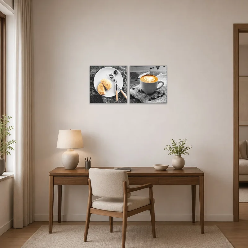 Home office wall displaying croissant and coffee art to inspire work.