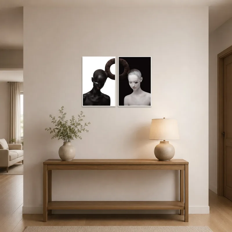 Black and white portraits offer a bold entrance hall statement.