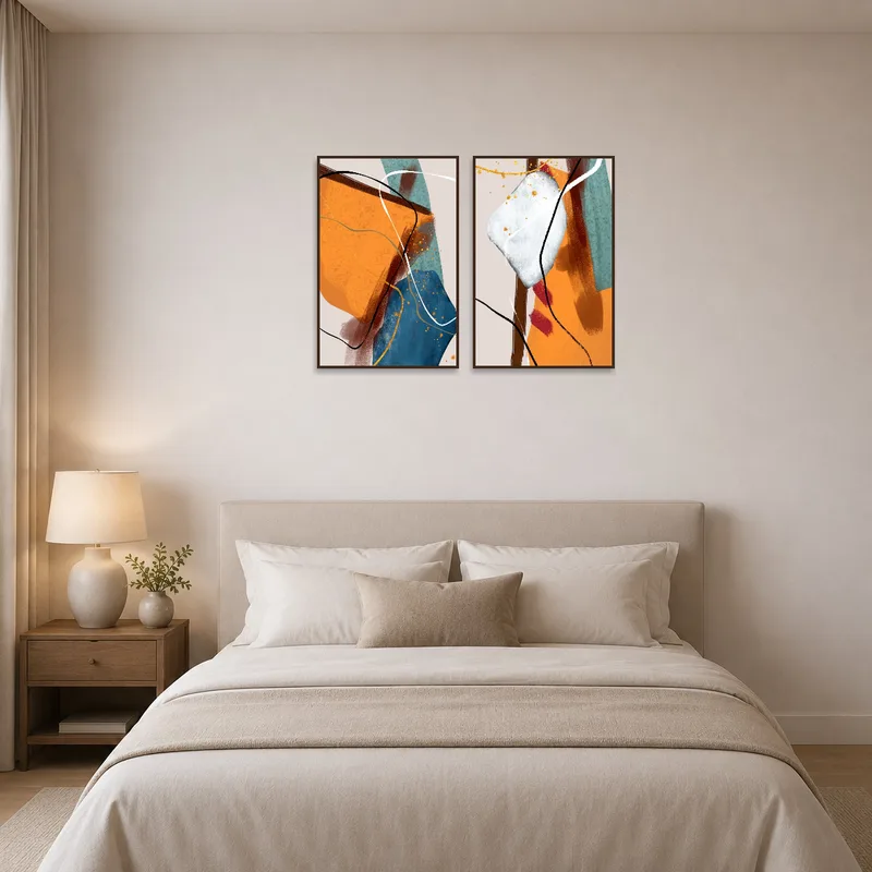 Abstract art set introduces color to the serene bedroom space.