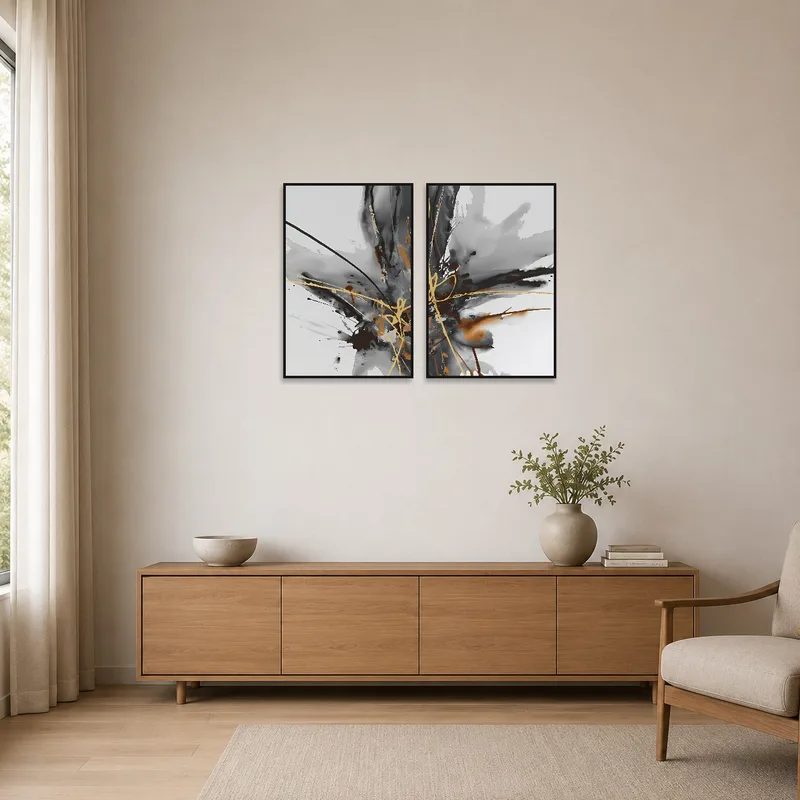 Minimalist interior showcasing a bold abstract piece featuring black, brown, and gold.