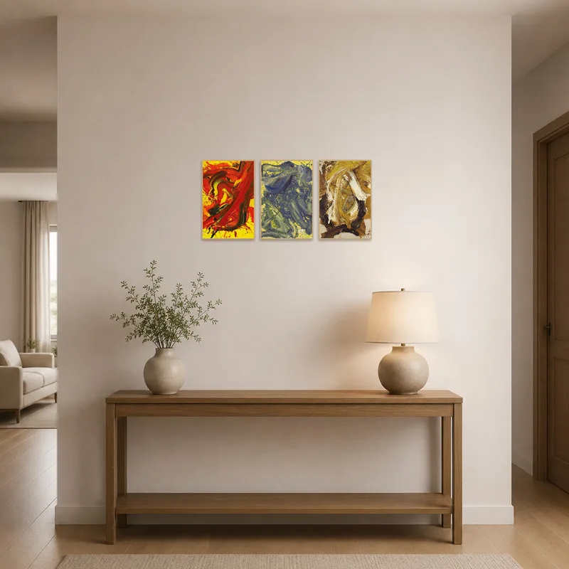Colorful abstract triptych greets visitors in a stylish entrance hall.