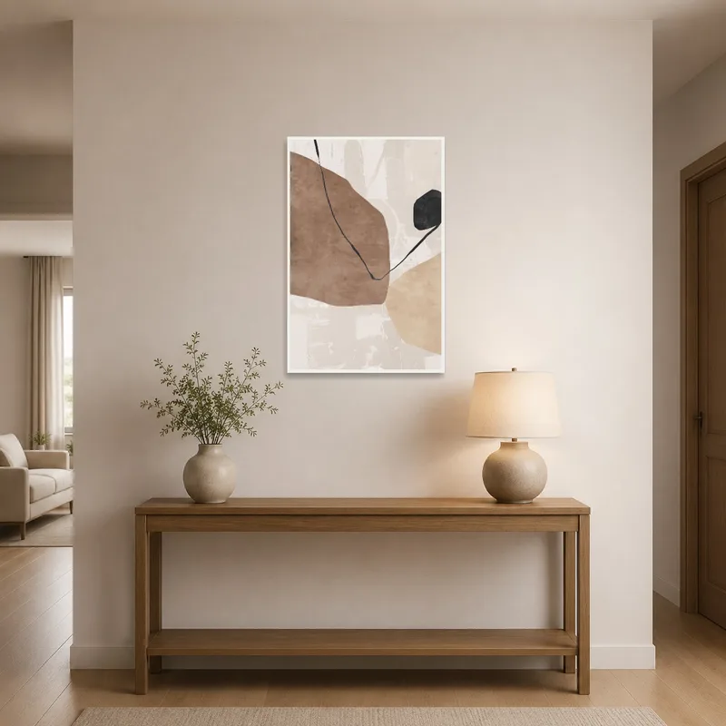 Earthy abstract art welcomes guests in a stylish entrance hall.