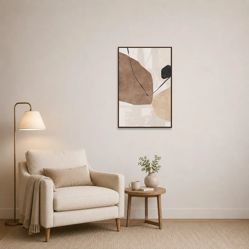 Abstract artwork in warm hues creating a cozy reading nook.